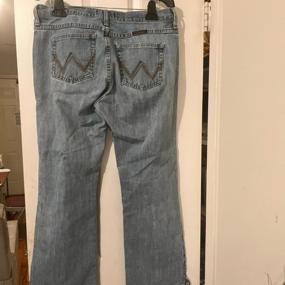 Wrangler light blue denim distressed bootcut jeans. - Picture 2 of 6